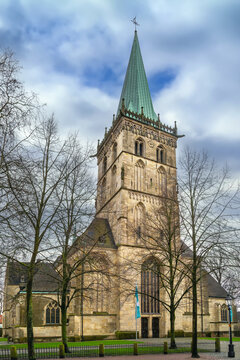 Historic St Felizitas church facade in Ludinghausen Germany low angle view. Beautiful late gothic building under cloudy sky
