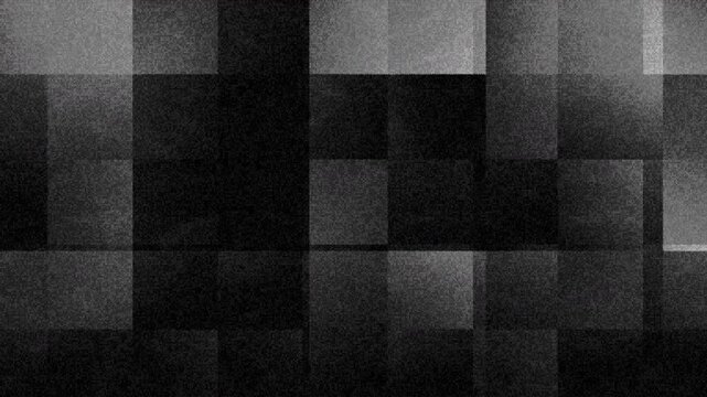 Abstract grayscale mosaic texture with layered geometric squares creates a modern industrial background