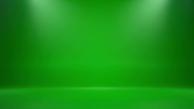 Green screen studio cyclorama with soft spotlighting and copy space for digital content creation
