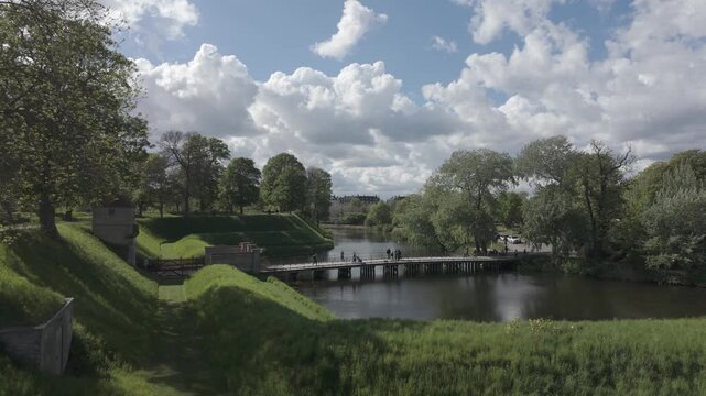 Cumulus clouds above the moat and ramparts of Kastellet