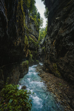 Turquoise river flowing through Partnach Gorge in Bavaria, Germany