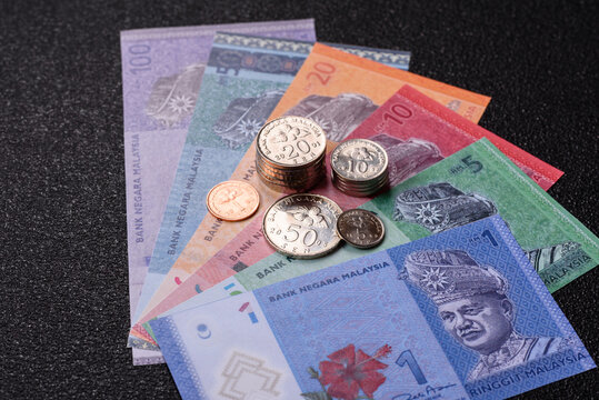 Malaysian ringgit banknotes as a tool for trade and financial transactions. The Malaysian ringgit