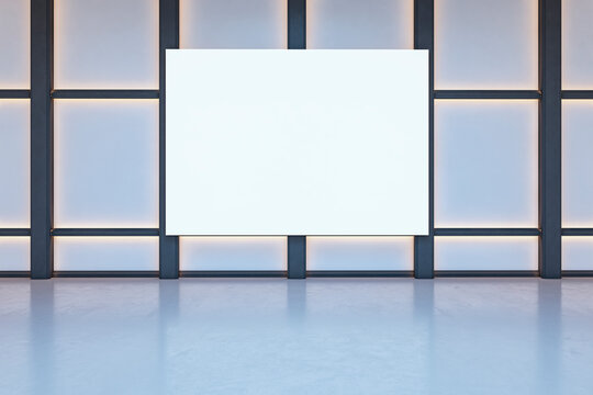 Blank white poster mockup on a clean modern glass wall with soft light, reflective floor, and spacious interior presentation display. 3D Rendering