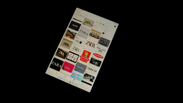 Tablet screen view with various sized Zara logos, on a black background, August 1, 2026