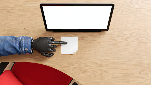Top View of Black Robot Hand Pointing at Blank Note on Wooden Desk