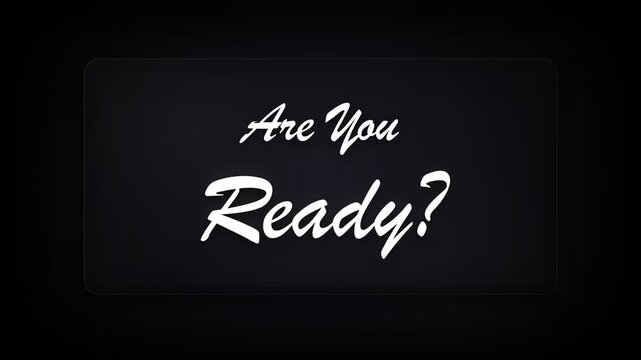 A bold white cursive script displays the questioning phrase Are You Ready over a dark moody surface to inspire immediate action for an upcoming challenge or event that requires full preparation