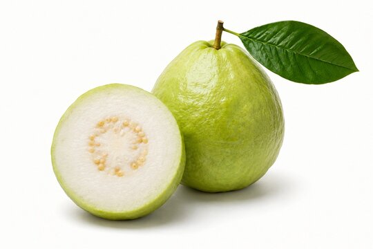 Fresh white guava fruit with green leaf and half slice isolated on a white background. Organic tropical fruit rich in vitamin C, perfect for healthy eating, juice, and dessert concept.