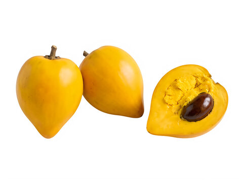 Fresh whole and sliced yellow canistel eggfruit on a surface isolated on transparent background