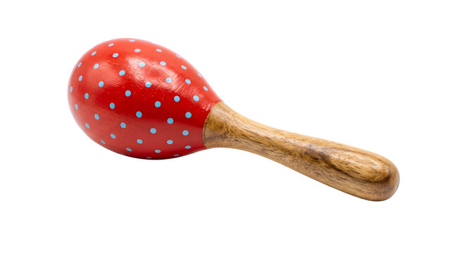 A red wooden maraca with blue polka dots isolated on transparent background