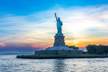 Statue of Liberty at Sunset with Colorful Sky, New York City, USA © Abid