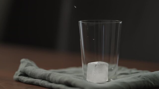 Slow motion making ice latte at home closeup shot