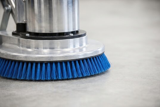 Floor scrubber machine cleaning concrete surface commercial equipment