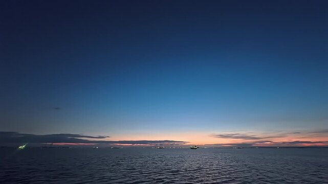 Cinematic real-time video of serene twilight ocean horizon at dusk for meditation and deep sleep