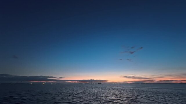 Concept background footage of night seascape for cargo shipping, international trade, and supply chain