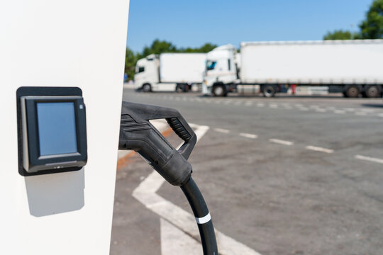 Heavy-duty electric truck charging station at a large highway transport hub