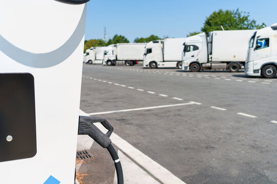 Heavy-duty electric truck charging station at a large highway transport hub