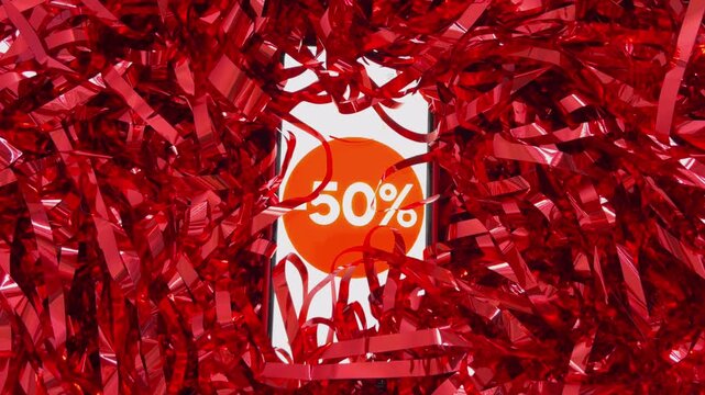 Smartphone with fifty percent discount promotion on red tinsel for special offer, black friday, cyber monday, online shopping, seasonal sale and christmas gift ideas