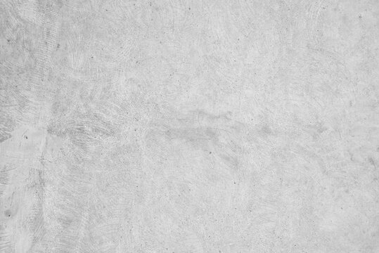 Abstract background of a gray concrete wall. Smooth and clear surface. Grunge style, polished cement. For outdoor use. Cement texture, cement surface.