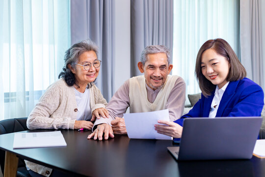 Asian senior couple got advice from lawyer on legal financial contract and insurance health care benefit for retirement home visit service professional consultant