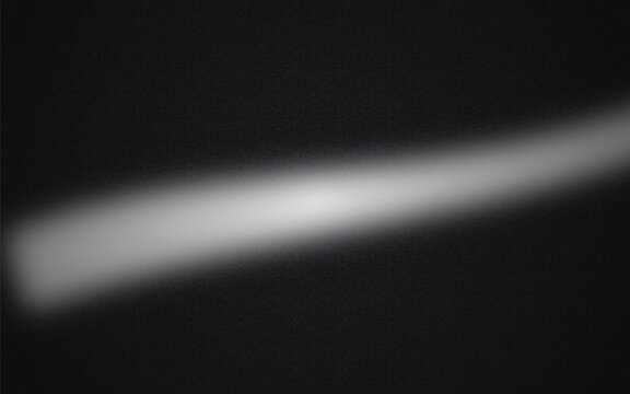 Diagonal light beam effect on dark grainy background for cinematic atmosphere and lighting.
