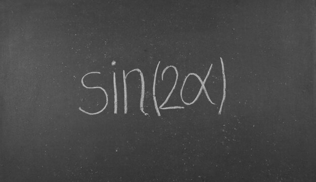 The formula for the sine of a double angle on a black school board