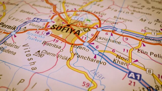 road network to sofia, bulgaria, gliding macro view over atlas map