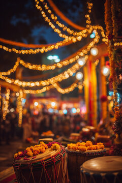 Durga Puja pandal decorated with fairy lights marigold garlands and traditional dhak drums at night
