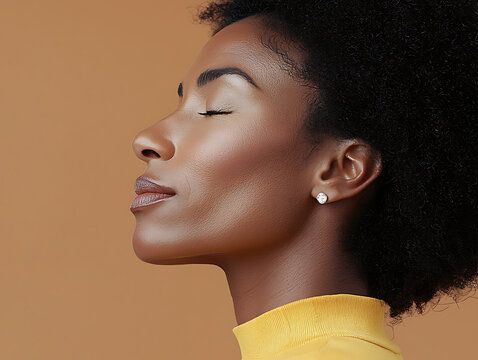 Serene Black woman with eyes closed, profile view, wearing a diamond stud earring