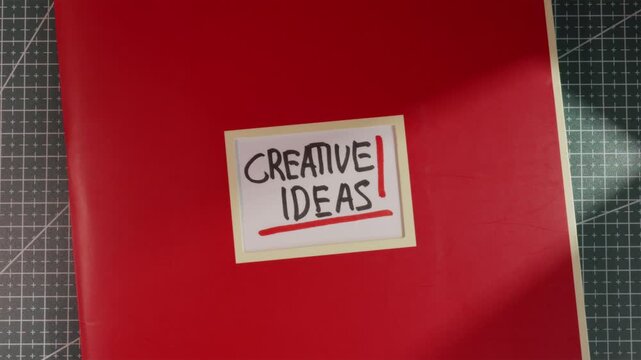 Panoramic top down view of Creative Ideas red notebook
