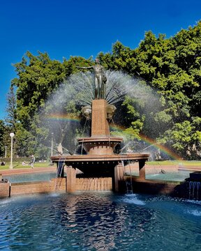 Archibald memorial fountain with rainbow in Hyde park Sydney Australia