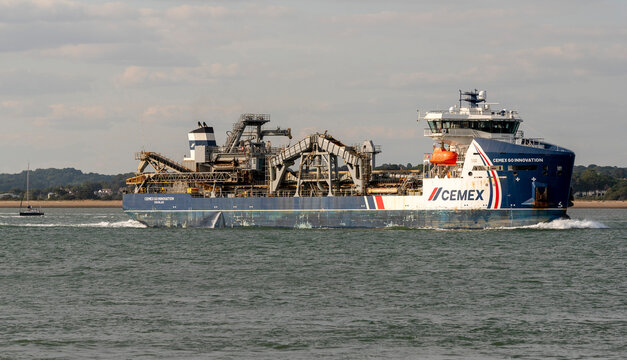 Southampton Water England UK. 01.08.2026. large, specialised ship with extensive conveyor systems for aggregate dredging and cranes i