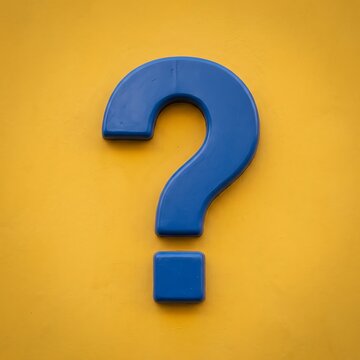 Blue question mark symbol on yellow background.