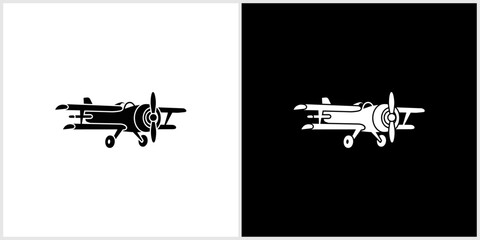 Classic Biplane Aircraft Icon - Black and White Vector Design © nizar