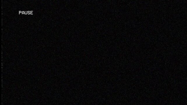Pause vhs grainy black screen with white text overlay and vintage noise suitable for retrothemed video projects or nostalgic designs.