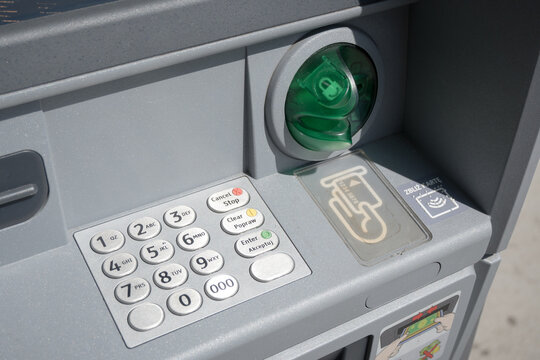 An ATM, a device for withdrawing and depositing cash.
