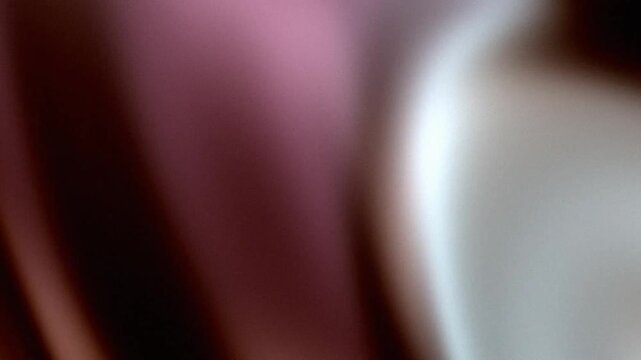 Elegant grainy texture with soft warm brown and mauve color gradient