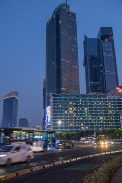 Night lights highlight the iconic Selamat Datang Monument at Hotel Indonesia Roundabout in Jakarta