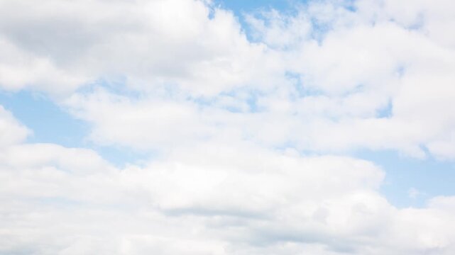A beautiful timelapse of white clouds moving rapidly across the sky