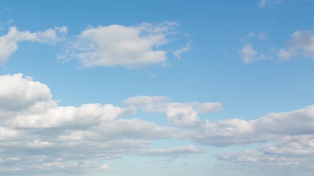Beautiful Timelapse of fast moving white clouds across the blue sky, atmosphere and sky