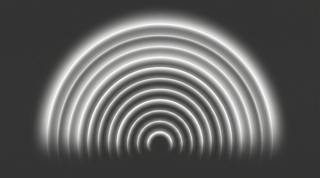 Abstract background featuring concentric glowing white arcs radiating on a smooth dark gray gradient surface