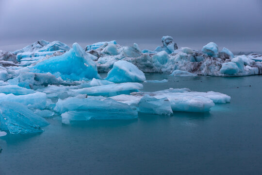 Jokulsarlon glacier lagoon blue icebergs drifting in Iceland
