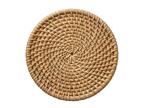 Round woven wicker coaster or placemat made of dry grass isolated on transparent background