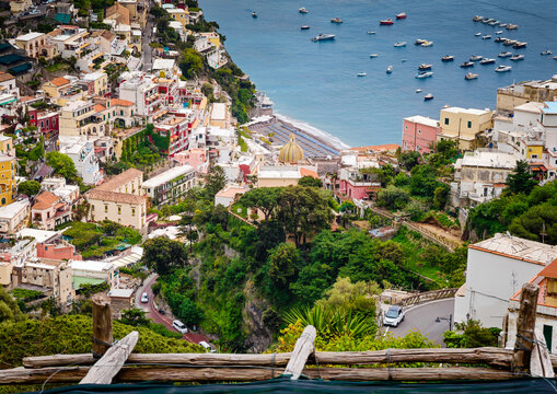 Stunning aerial drone panorama of Positano on the Amalfi Coast, Italy, colorful hillside houses, dramatic cliffs and the Mediterranean Sea
