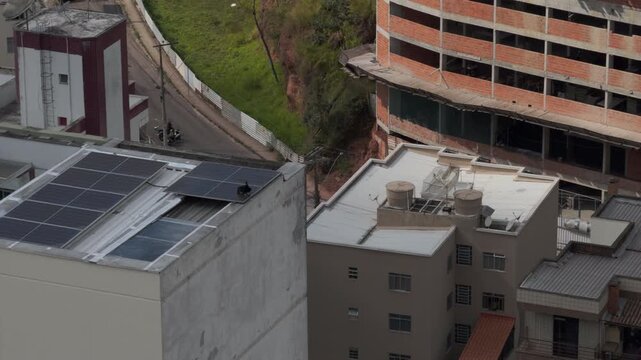 Elevated Urban View of Juiz de Fora With Rooftop Solar Panels