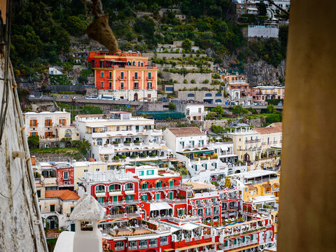 Stunning aerial drone panorama of Positano on the Amalfi Coast, Italy, colorful hillside houses, dramatic cliffs and the Mediterranean Sea