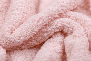 Close Up Detail Of Soft Pink Plush Sherpa Fleece Fabric Wrinkles Background © Traan