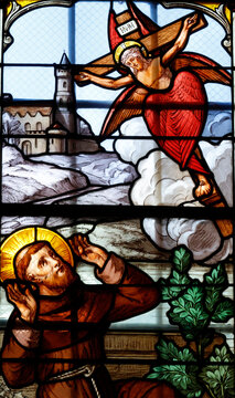 Notre-Dame Collegiate Church. A stained-glass window depicting the vision of Saint Francis of Assisi receiving the stigmata of the crucified Christ.