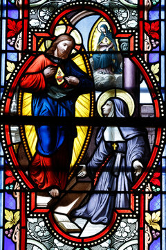 Notre-Dame Collegiate Church. Stained-glass window depicting the apparition of the Sacred Heart of Jesus to Saint Margaret Mary Alacoque.