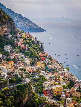 Stunning aerial drone panorama of Positano on the Amalfi Coast, Italy, colorful hillside houses, dramatic cliffs and the Mediterranean Sea