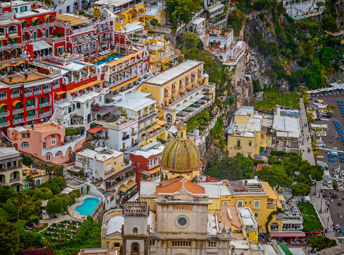 Stunning aerial drone panorama of Positano on the Amalfi Coast, Italy, colorful hillside houses, dramatic cliffs and the Mediterranean Sea